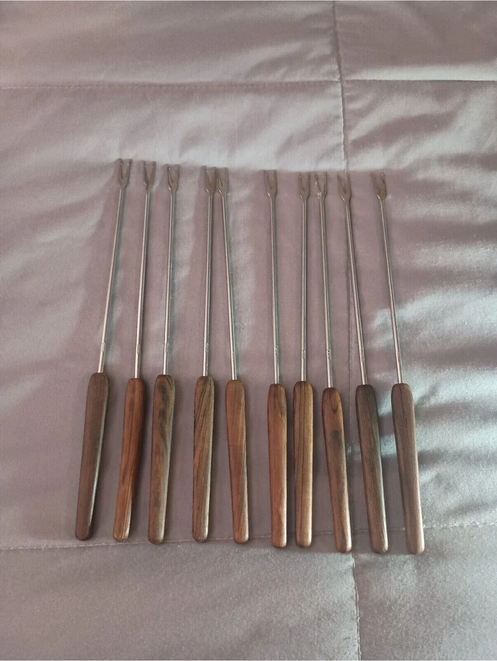 Set of 10 vintage fondue forks labeled  rostfrei